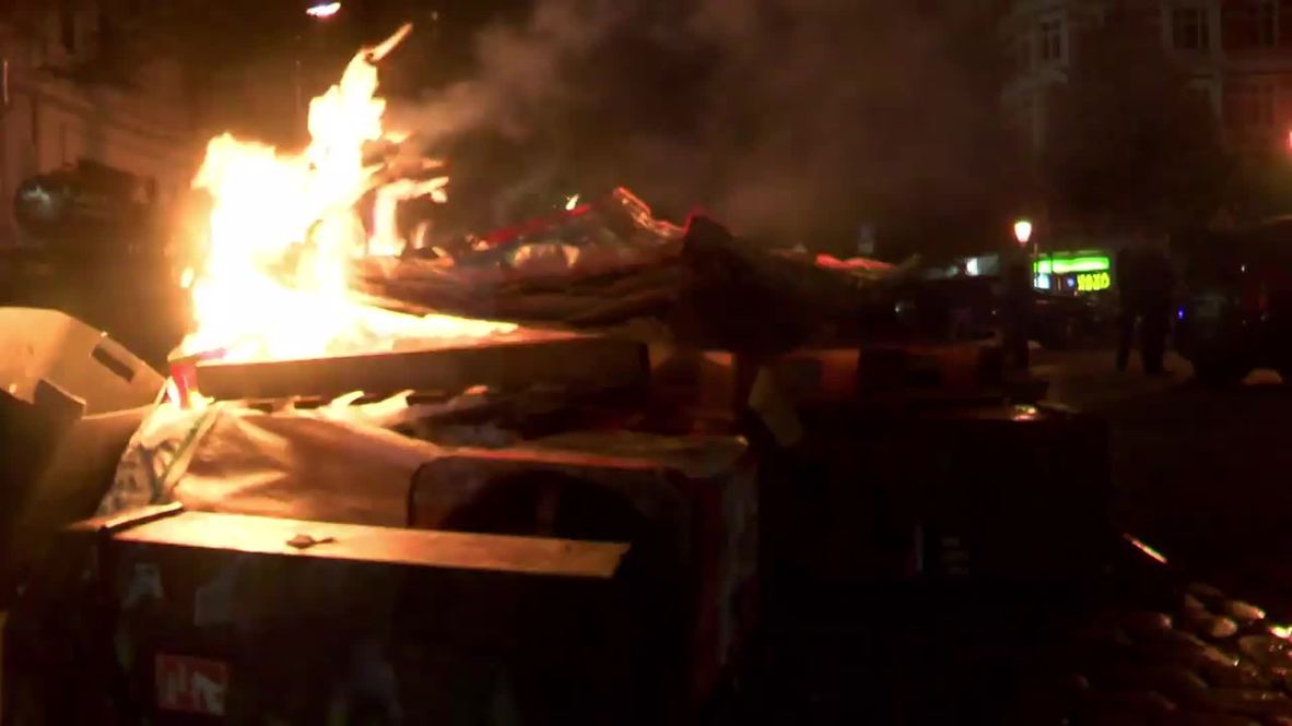 Germany: Riot police use water cannon to extinguish anti-fascist fire