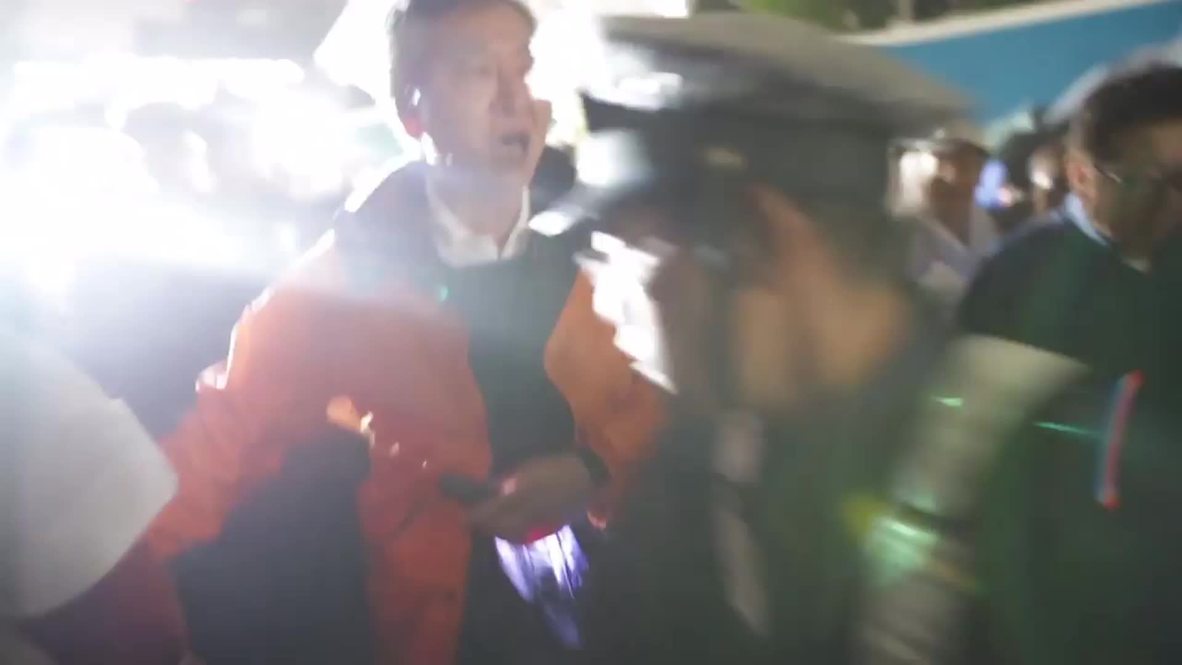 Japan: Anti-military protesters scuffle with Tokyo police