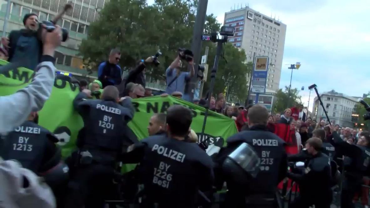 Germany: Far-right activists gagged by counter-protesters at anti-refugee demo in Munich