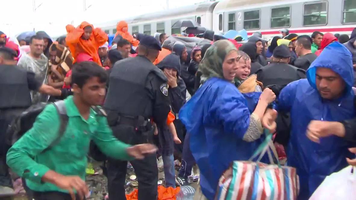 Croatia: Families divided as refugees struggle to board train