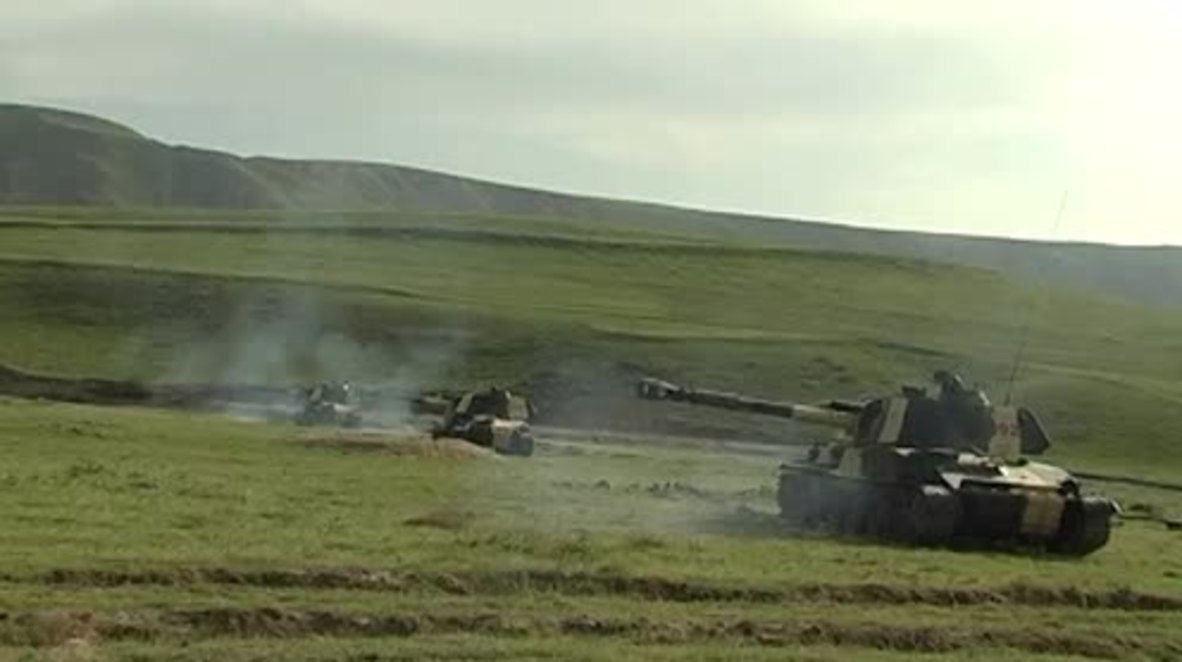 Tajikistan: Russian 2S3 Akatsiya artillery units carry out live fire drills