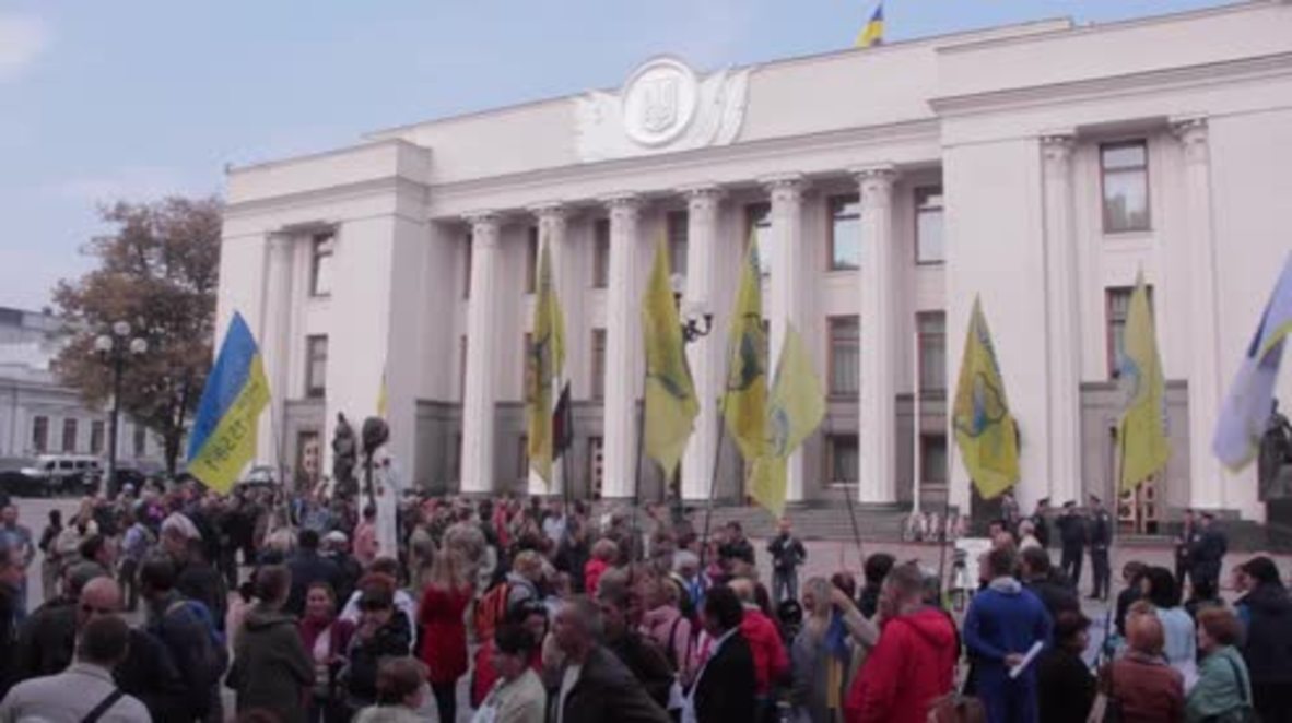 Ukraine: Duel protests hit Rada demanding troops home and debt restructured