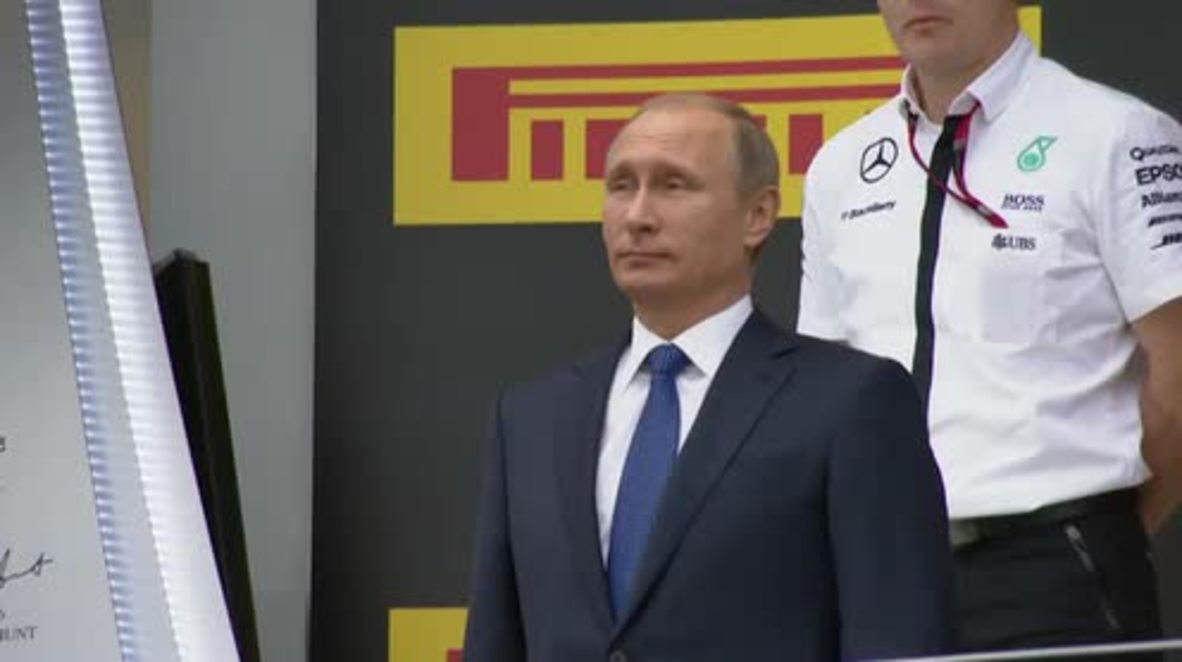 Russia: Putin awards Russian Grand Prix trophy to Lewis Hamilton