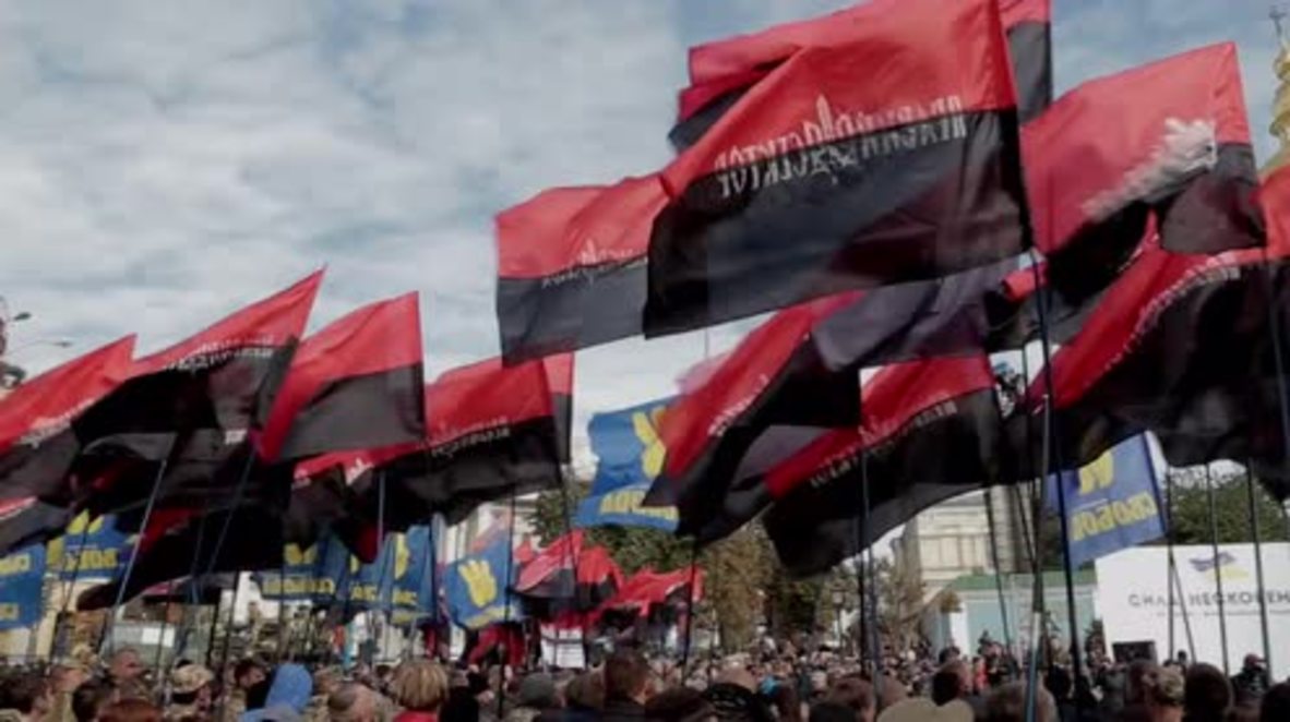 Ukraine: Svoboda and Right Sector supporters celebrate founding of the UPA