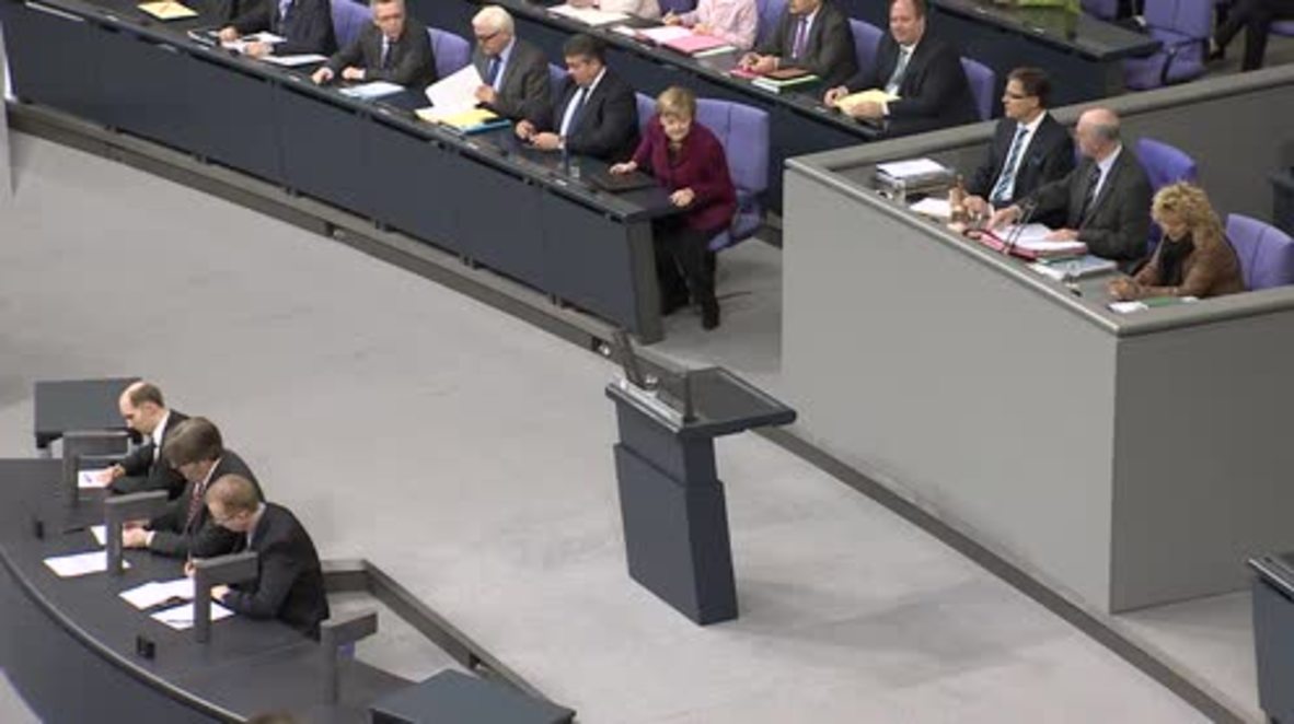 Germany: Merkel talks refugee controls as MPs back tougher legislation