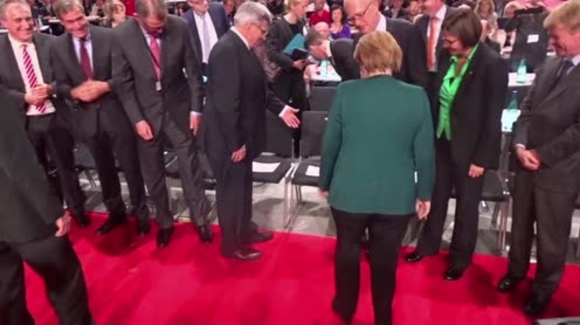 Germany: Merkel defends stance on refugees, urges moral action from EU