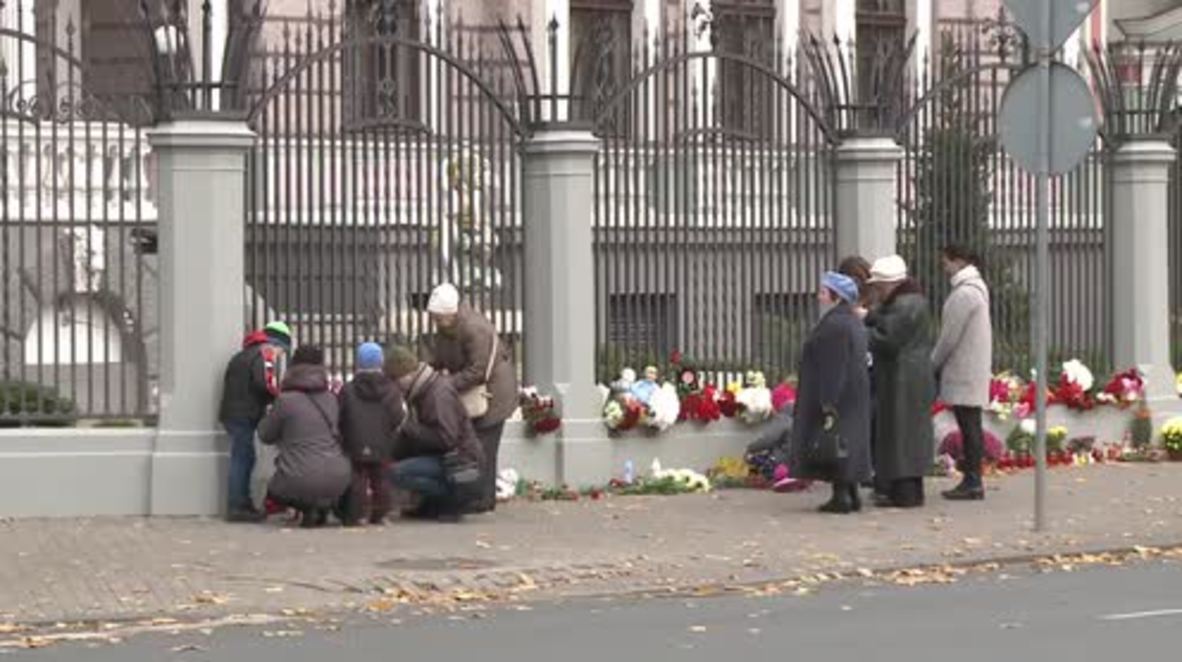 Latvia: Mourners pay tribute to victims of Russian Airbus A321 crash