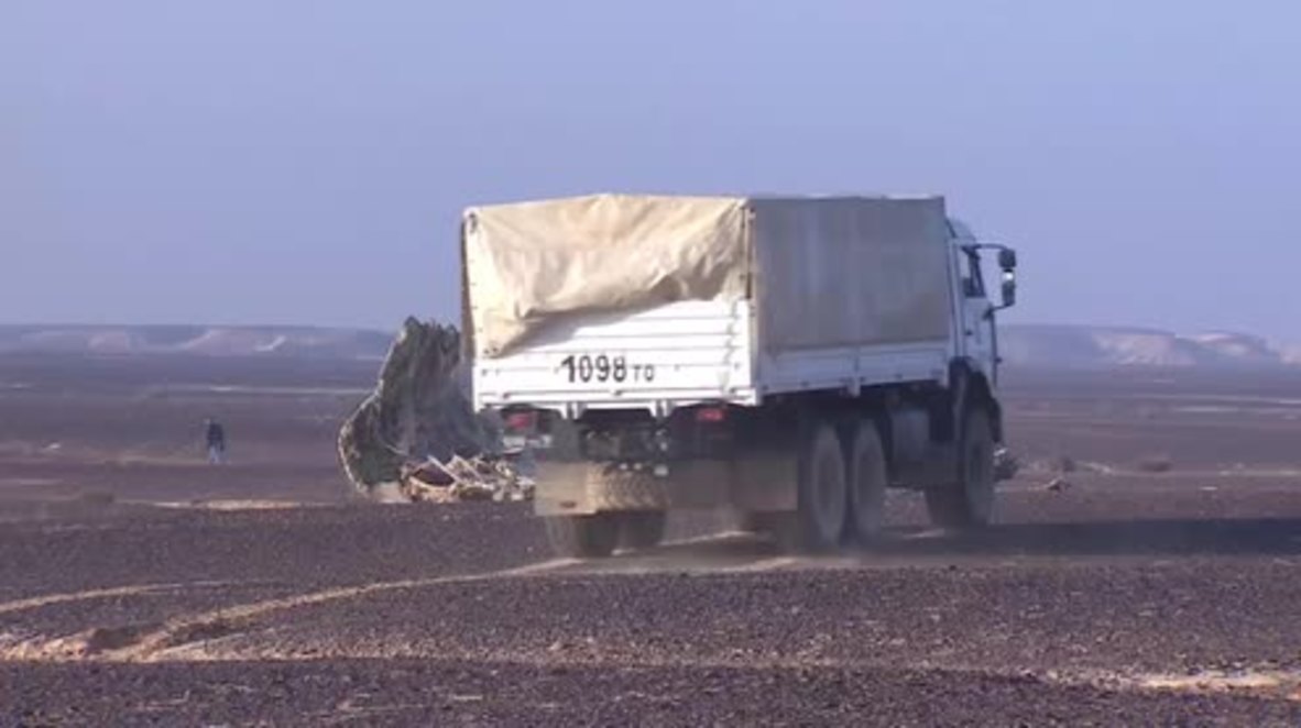 Egypt: EMERCOM workers search Sinai crash site for victims' belongings