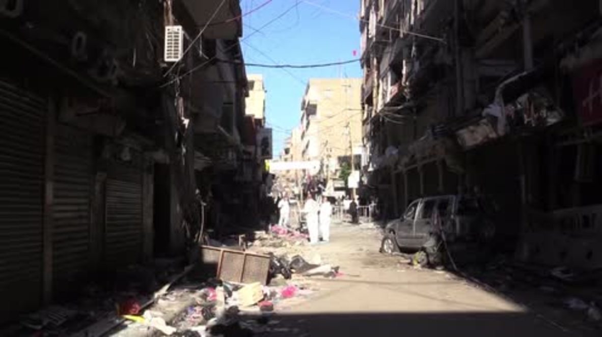 Lebanon: Police forensic experts inspect double bomb site in southern Beirut