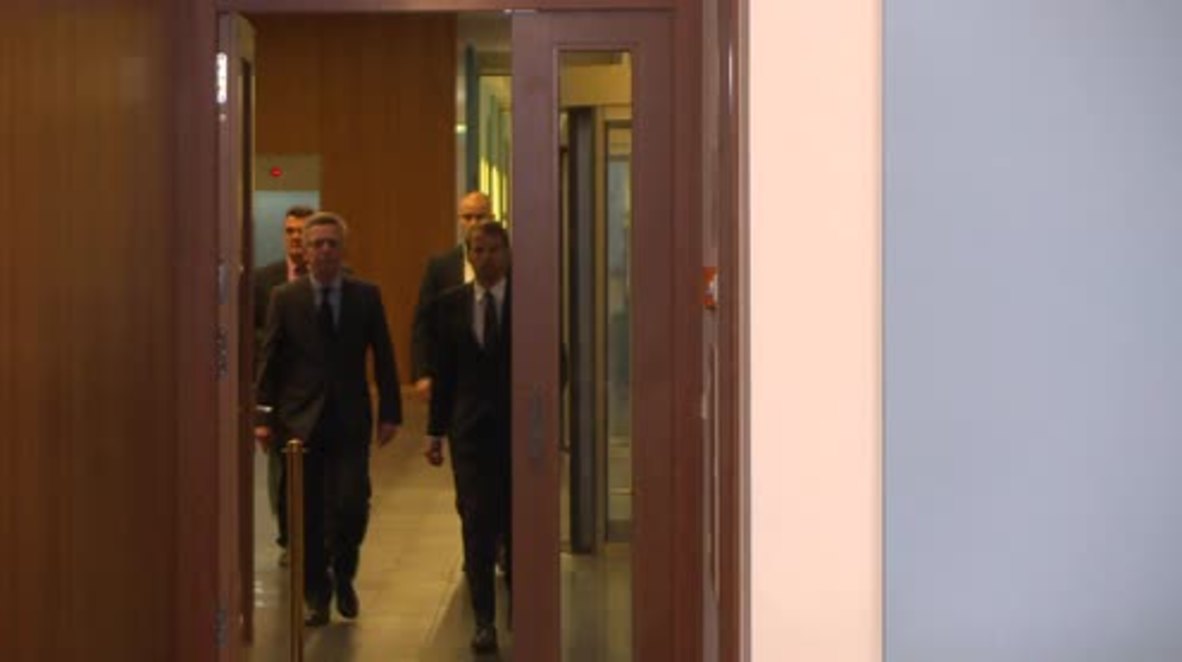 Germany: Avoid mixing issues of terror with resposibility to refugees - Interior Minister