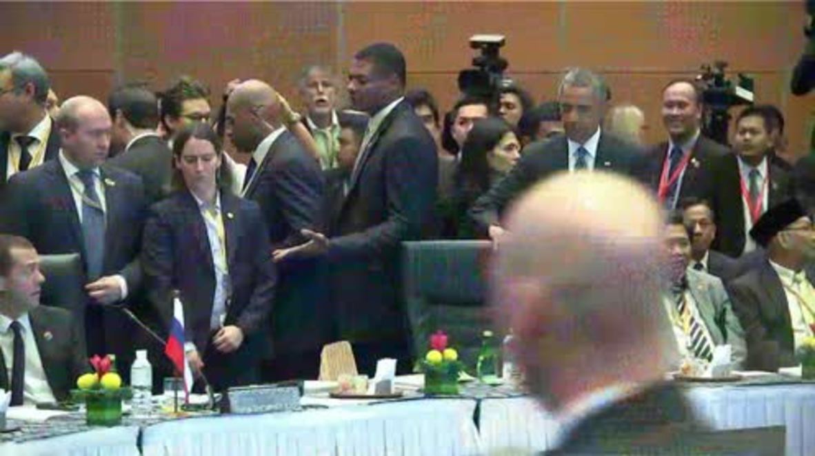 Malaysia: Obama and Medvedev shake hands at the East Asia Summit