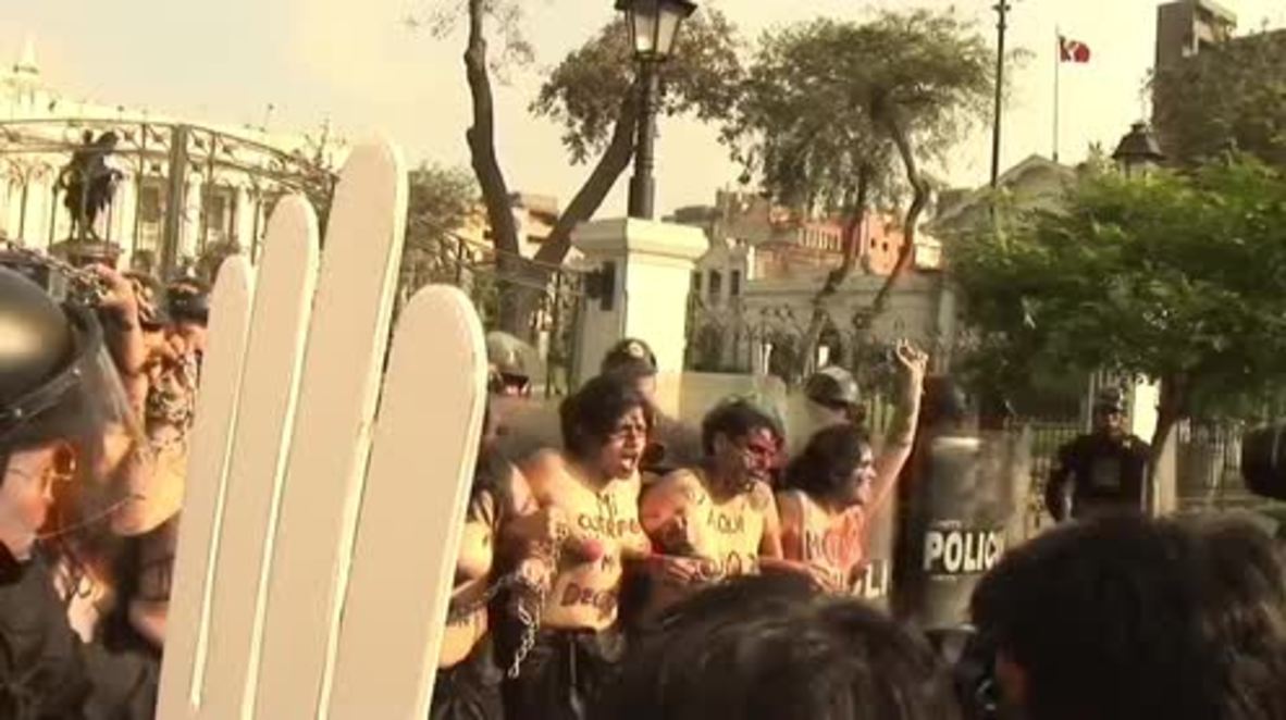 Peru: Topless activists tear-gassed during march against forced sterilisation *EXPLICIT*