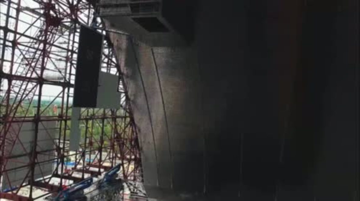 Ukraine: Drone footage shows Chernobyl sarcophagus under construction