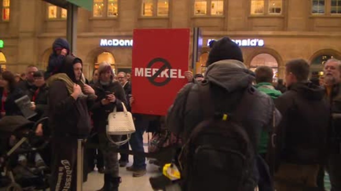 Germany: Merkel heckled by protester at Leipzig train line inauguration