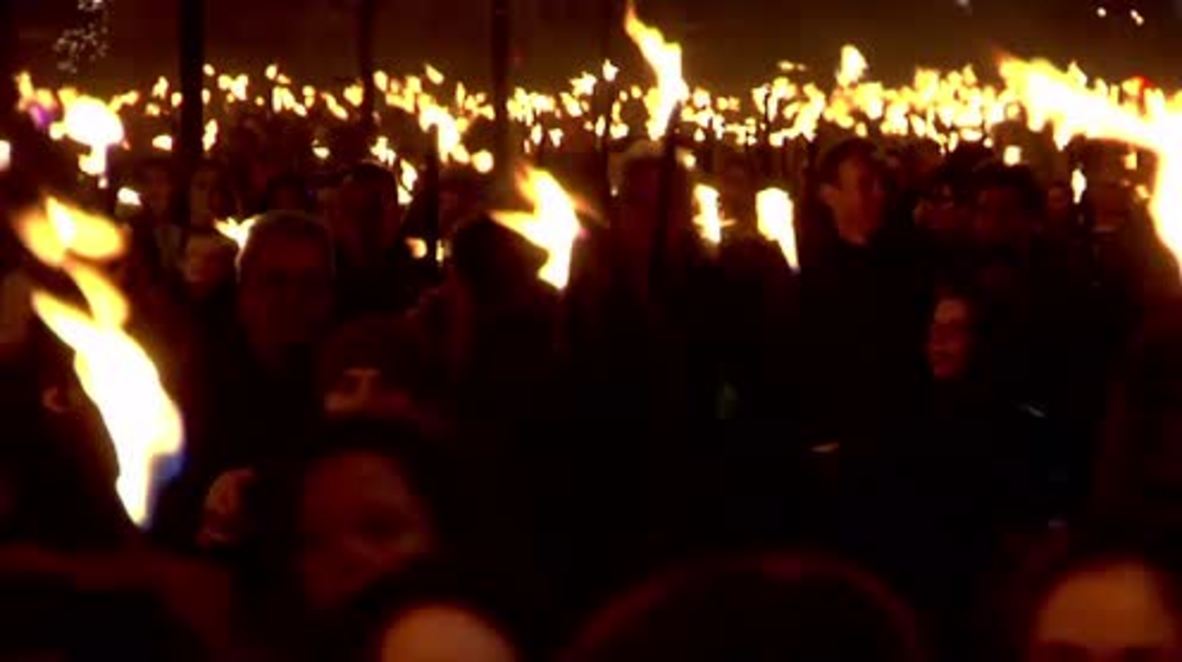 Netherlands: Thousands rally in torch-lit march for peace in Eindhoven