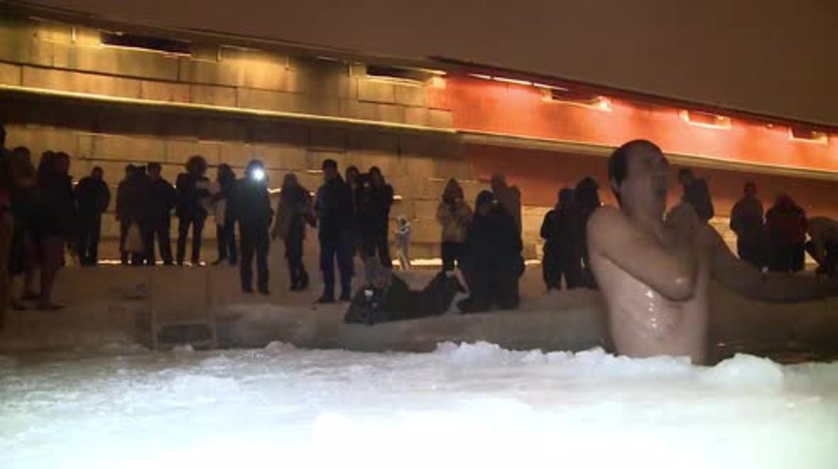 Russia: St. Petersburg's bold and beautiful take icy plunge for Epiphany