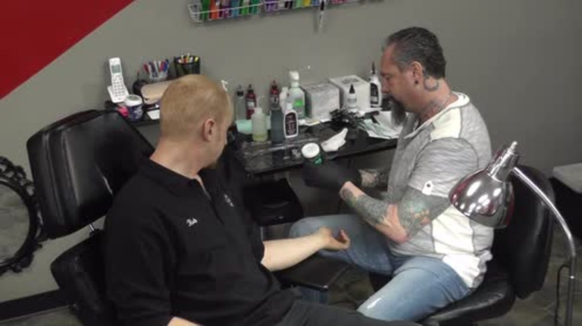 USA: Trump stamp! Meet the New Hampshire tattooist offering free Trump tats