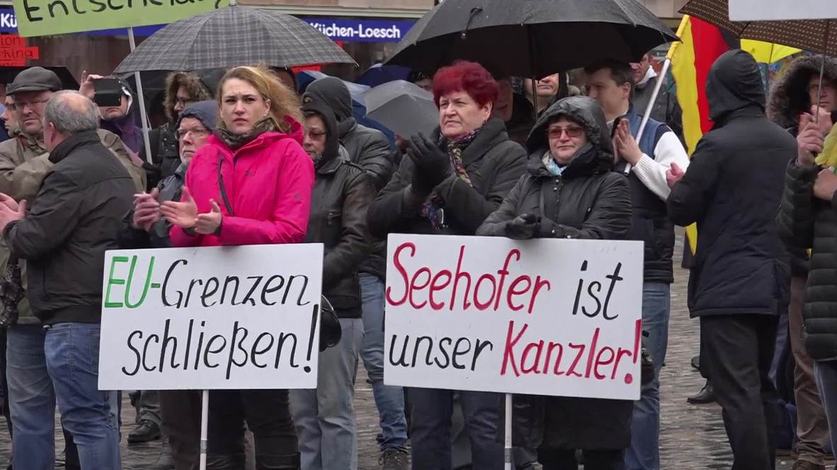 Germany: Antifa rail at Russians during anti-refugee protest