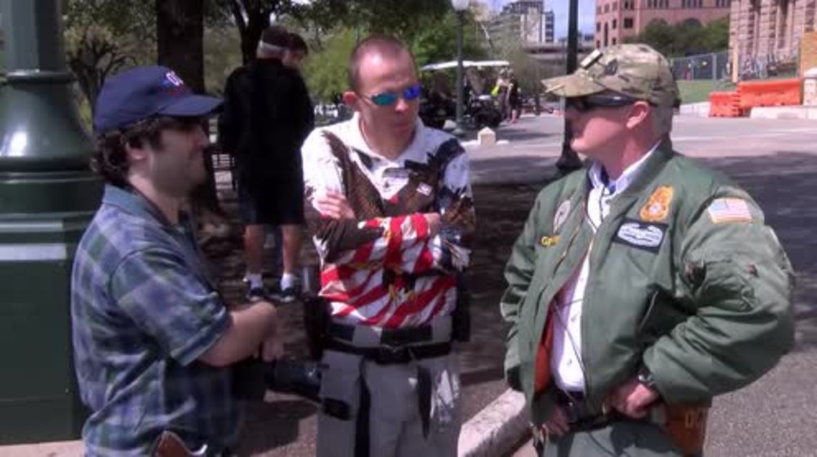 USA: 'More boobs less guns' - Counter protester disrupts Open Carry rally at SXSW *EXPLICIT*
