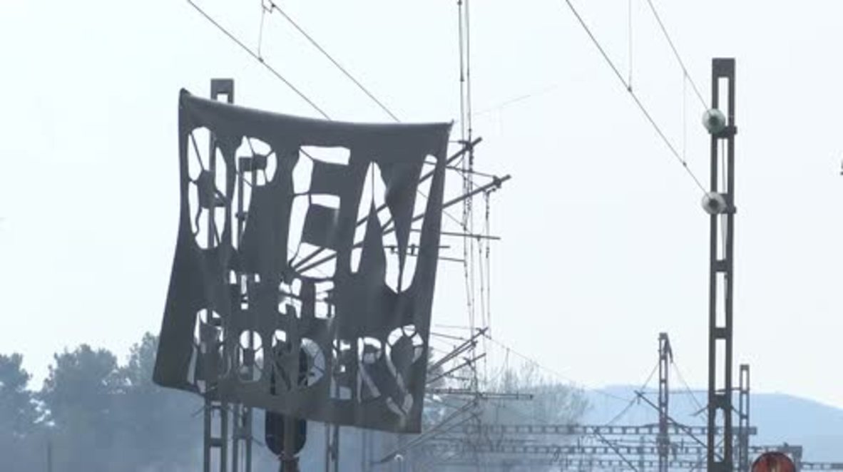 Greece: Refugees hold sit-in protest at Idomeni train station