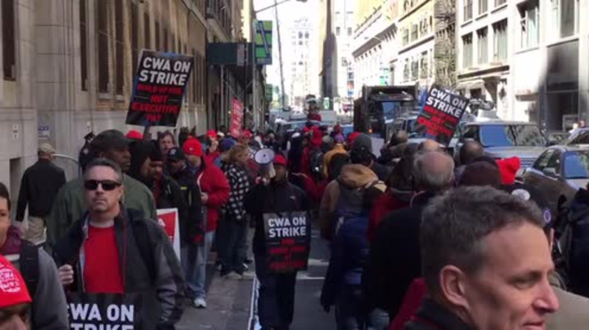 USA: Striking Verizon workers picket New York offices