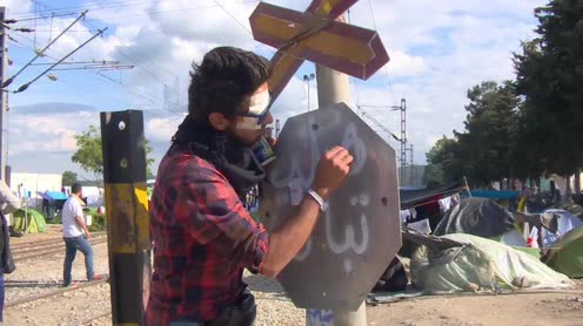 Greece: Syrian refugees at Idomeni stage protest in support of Aleppo