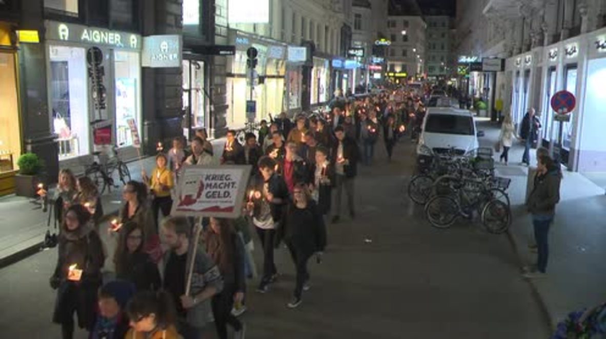 Austria: Hundreds hold torchlit march against arms trade in Vienna