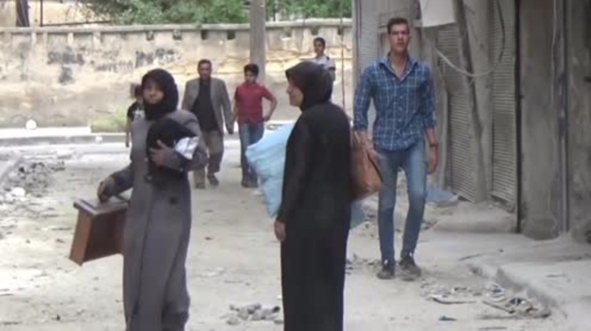 Syria: Aleppo residents begin clearing rubble after ceasefire agreement