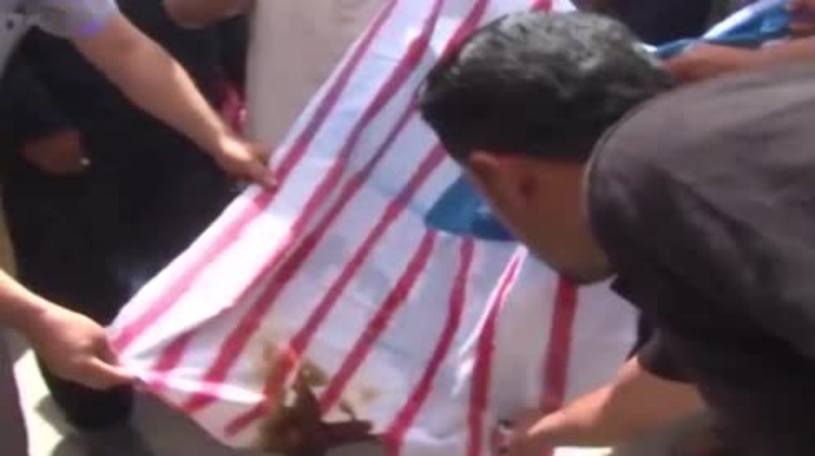 Syria: US flag burns as Communist Party supporters decry US presence in Rmelan