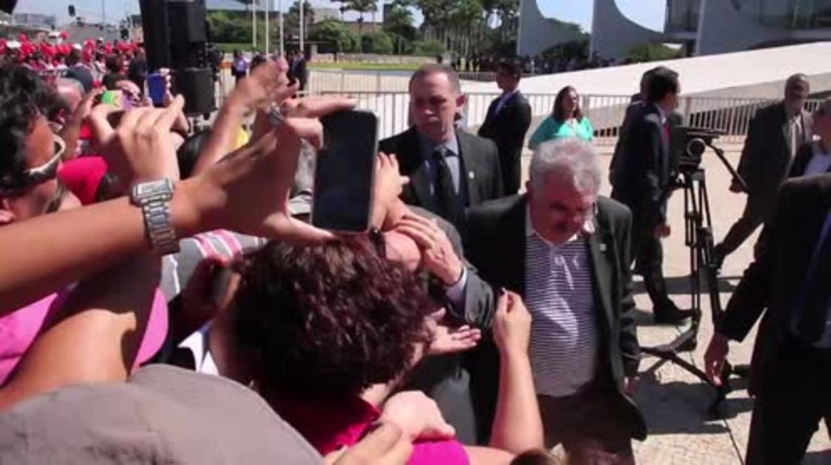 Brazil: Emotional Lula embraces protesters outside Palacio do Planalto