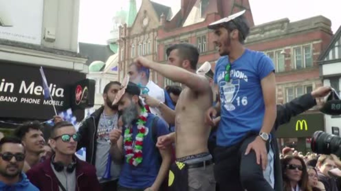 UK: Leicester fans cheer triumphant team after Premier League win