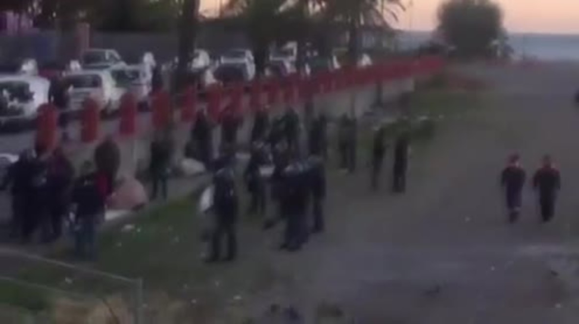Italy: Priest protects runaway refugees from police after camp eviction