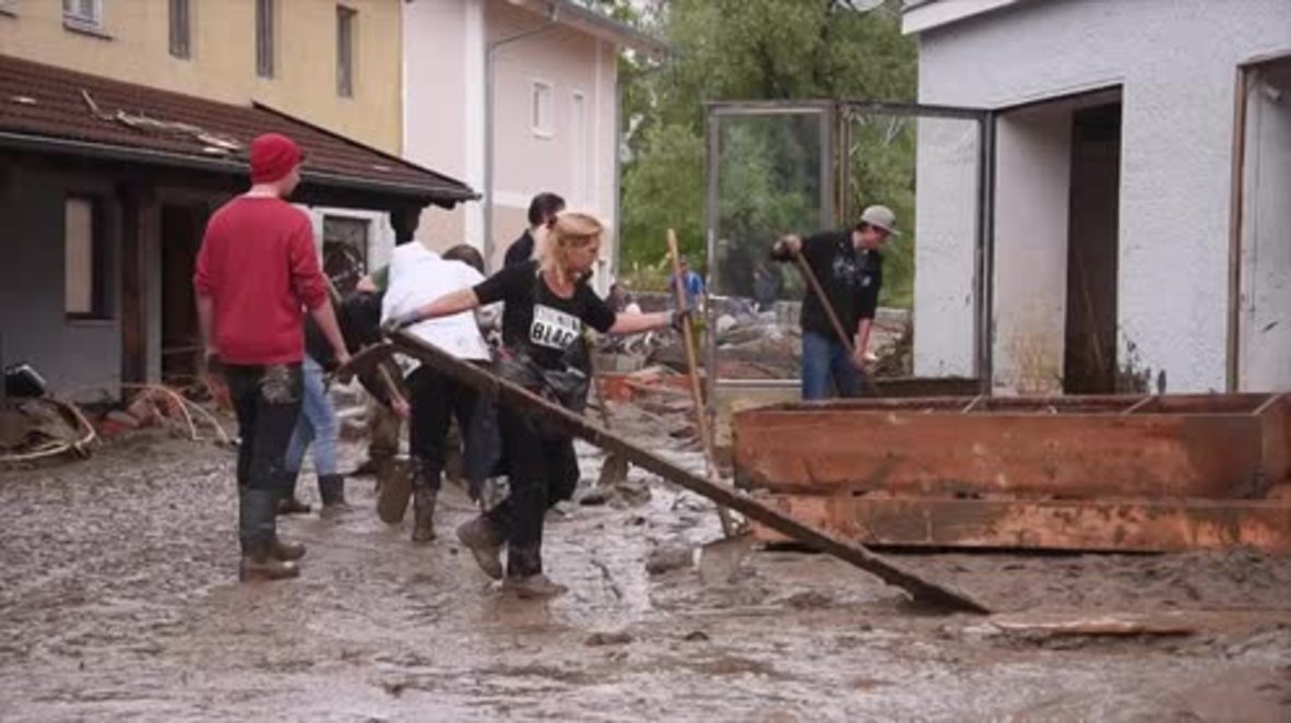 Germany: Residents clear buildings after devastating floods