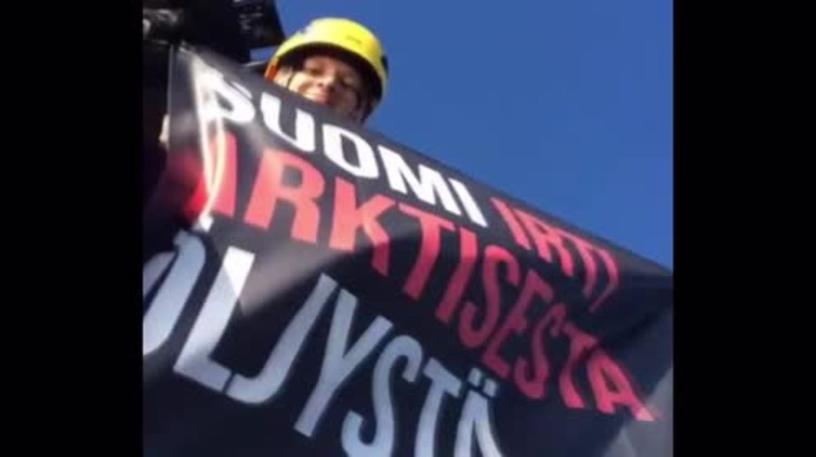Finland: Greenpeace activists climb icebreaker in protest against Shell