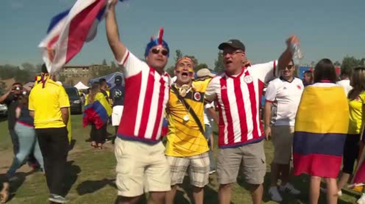 USA: Colombian and Paraguayan football fans warm up for Copa America