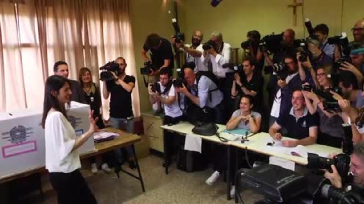 Italy: Rome mayoral election 1st round winner Raggi casts 2nd round vote