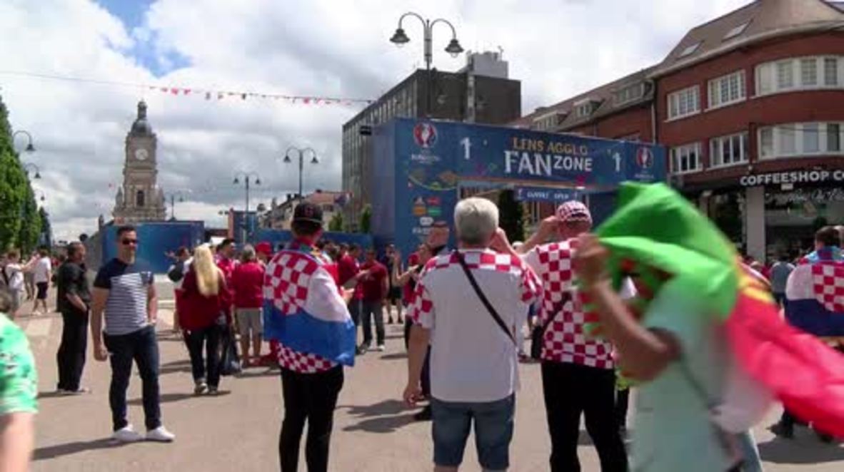 France: Portuguese and Croatian fans paint the town red ahead of Euro showdown