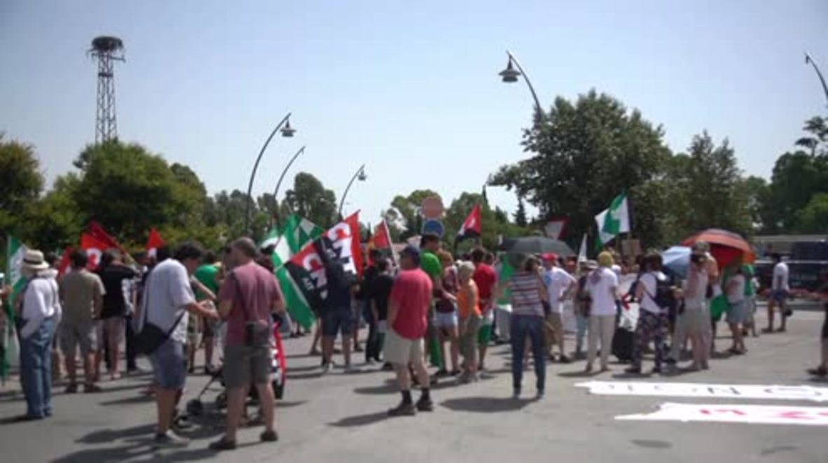 Spain: Protestors rally outside US Naval Station Rota during Obama's visit