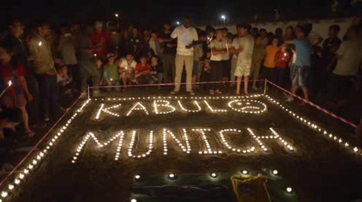 Serbia: Refugees honour Munich and Kabul attack victims with candlelit vigil