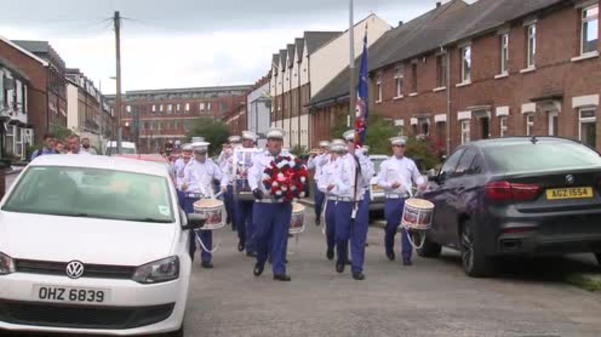 UK: Hundreds of loyalists march through Belfast to bolster UDA