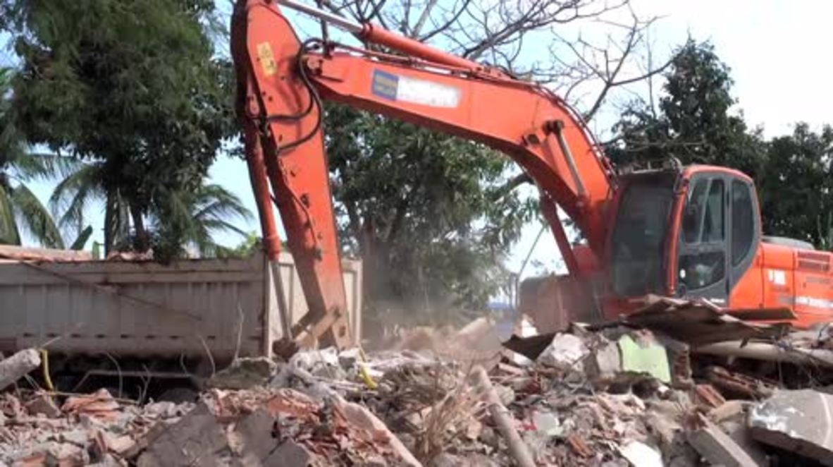 Brazil: Favela families moved into new houses on doorstep of Olympic Park