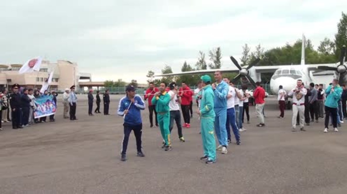 Kazakhstan: Kazakh sportsmen pull 15-ton An-26 jet to show support for Rio athletes