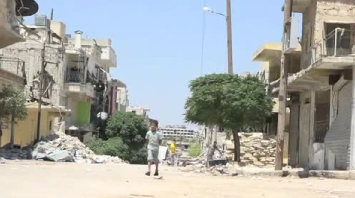 Syria: Aleppo residents receive aid at IDP camp after fleeing militant-held areas