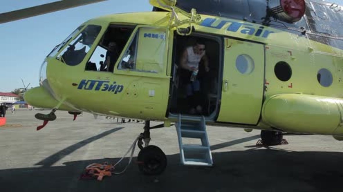 Russia: Nation's strongest woman pulls eight-tonne helicopter at air show