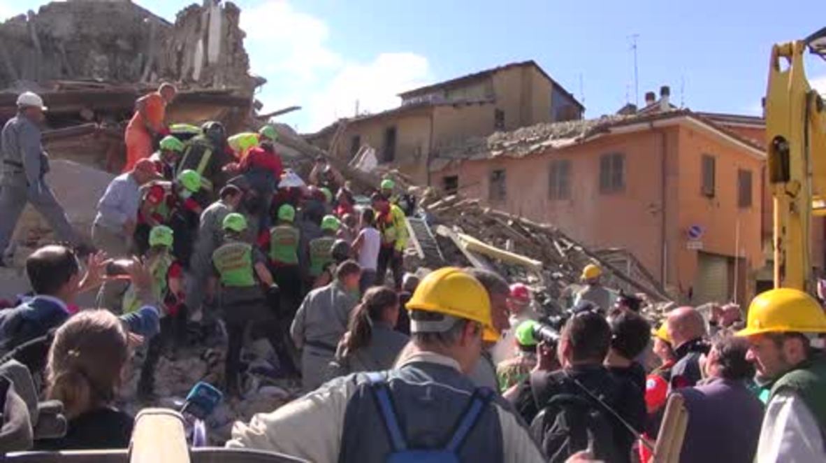 Italy: Rescuers search for earthquake survivors in devastated Amatrice