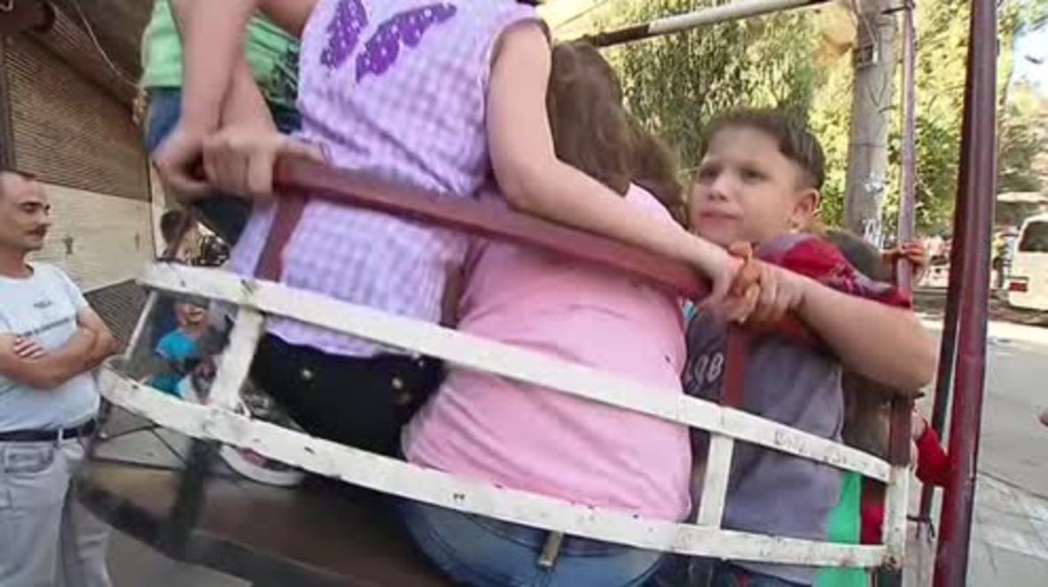 Syria: Children come out to play after first night of ceasefire in Aleppo
