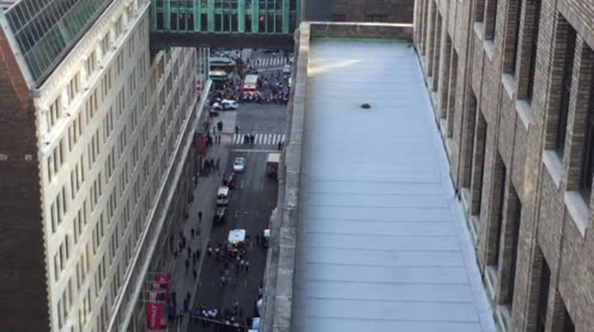 USA: Downton NYC on lockdown after police gun down man 'with meat cleaver'