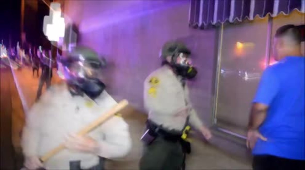 USA: 'Hands up, don't shoot!' - protesters and police standoff after fatal shooting