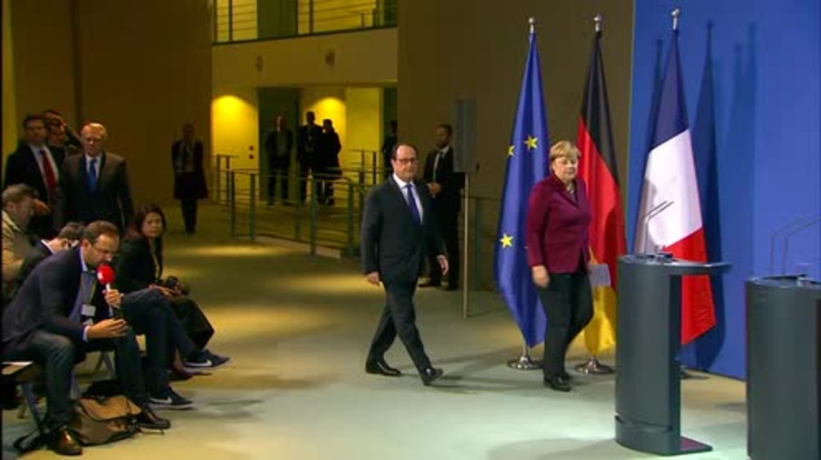 Germany: Merkel and Hollande accuse Russia and Syria of 'war crimes'