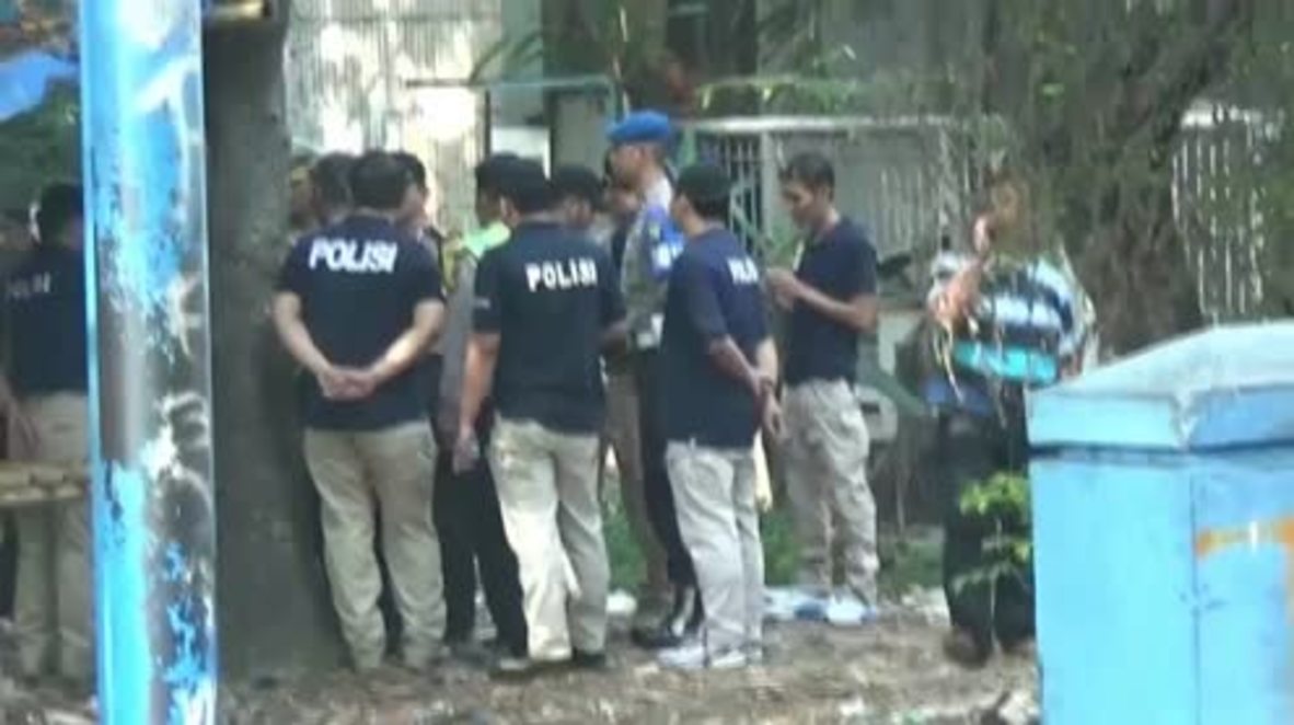 Indonesia: Police officers secure area following suspected terror attack